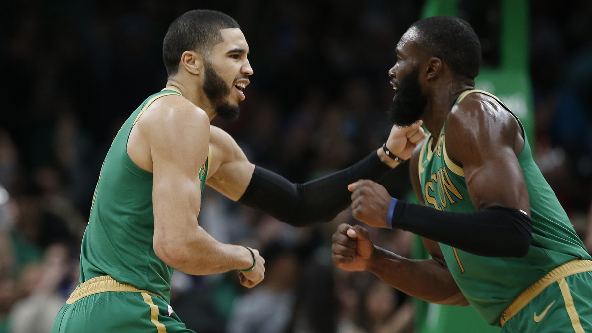 Jayson Tatum and Jaylen Brown of the Boston Celtics celebrate